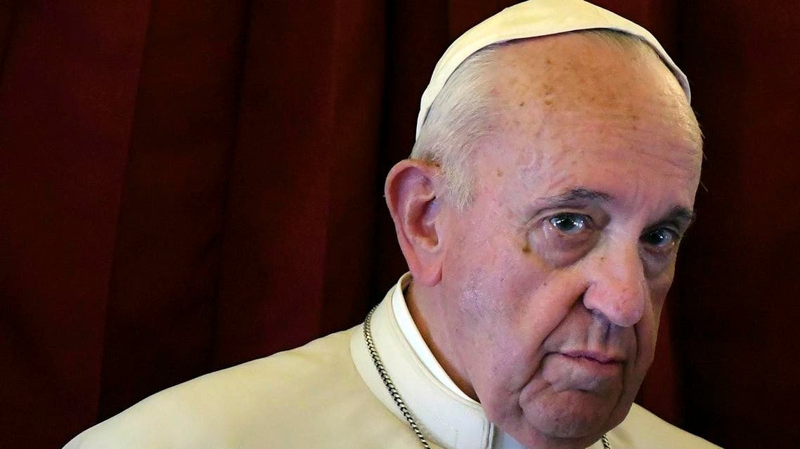 Pope Francis listens to a reporter’s question on board the flight back to Rome from a two-day trip to Morocco, Sunday, March 31, 2019. (AP)