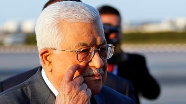 Palestinian President Mahmoud Abbas, gestures upon his arrival at Tunis-Carthage international airport to attend the Arab Summit, in Tunis, Tunisia, Saturday, March 30, 2019. (AP)