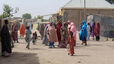 Residents are seen walking in Maiduguri, northeastern Nigeria. (AFP)