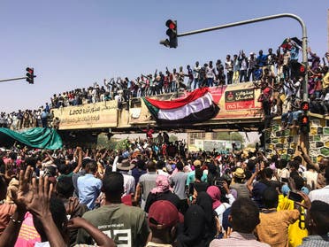 Protesters rally at a demonstration near the military headquarters on Tuesday in the capital Khartoum, Sudan. (AP)