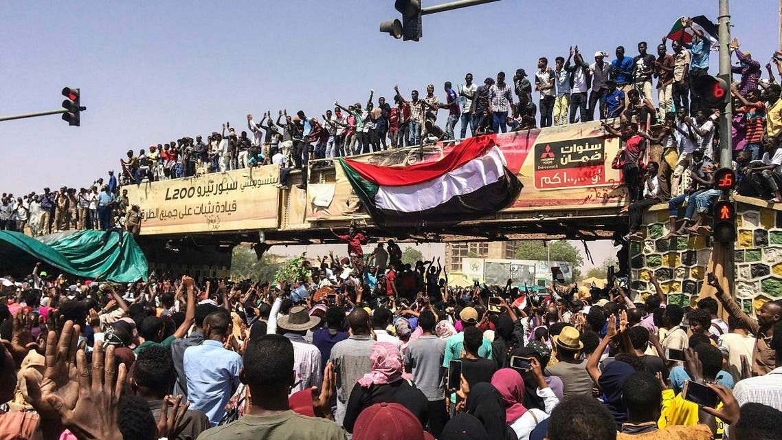 Protesters rally at a demonstration near the military headquarters on Tuesday in the capital Khartoum, Sudan. (AP)