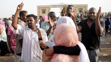  Sudanese demonstrators chant slogans as they protest against the army’s announcement that President Omar al-Bashir would be replaced by a military-led transitional council, in Khartoum on April 11, 2019. (Reuters)