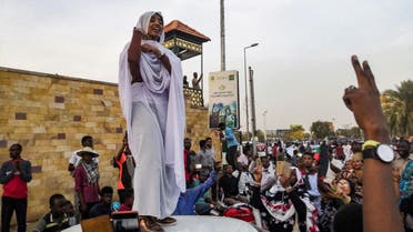 Alaa Salah addresses protesters in front of the military headquarters in the capital Khartoum. (AFP)