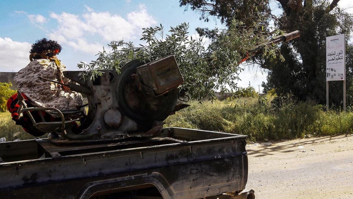 A fighter mans a turret stationed at a position held by forces loyal to Libya's Government of National Accord (GNA) in the suburb of Wadi Rabie about 30 kilometers south of the capital Tripoli on April 12, 2019. (AFP)