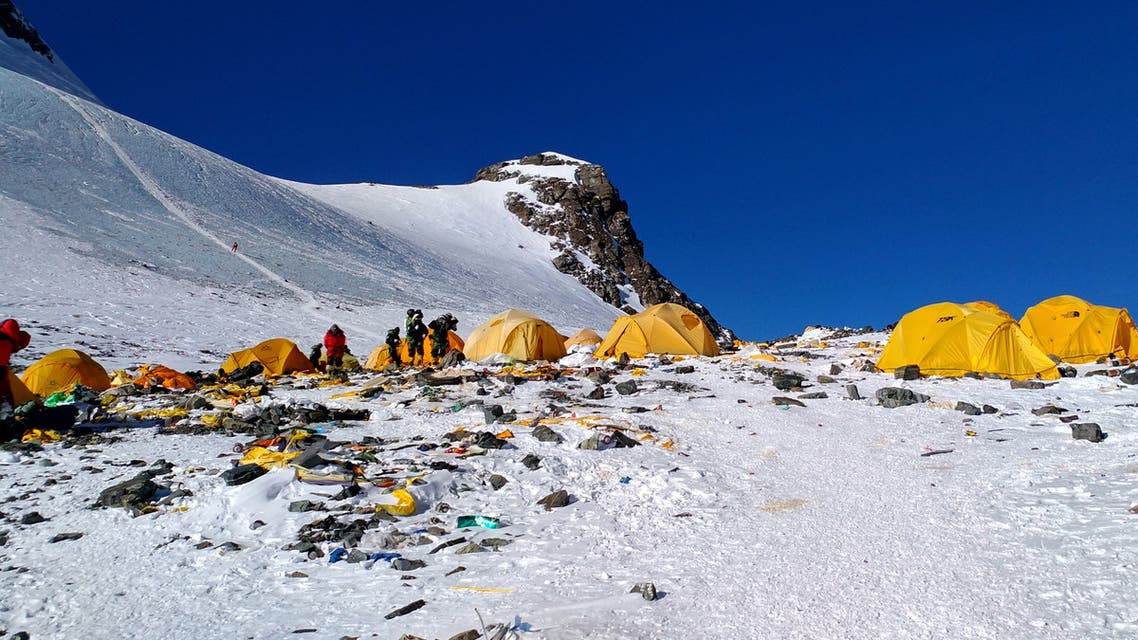 (FILES) This file picture taken on May 21, 2018 shows discarded climbing equipment and rubbish scattered around Camp 4 of Mount Everest. Climbers with pressing needs on Mount Everest will soon find an eco-friendly toilet at a Chinese campsite 7,028 metres (23,058 feet) above sea level in an ongoing campaign to deal with the peak's waste problem, it was reported on April 12, 2019.