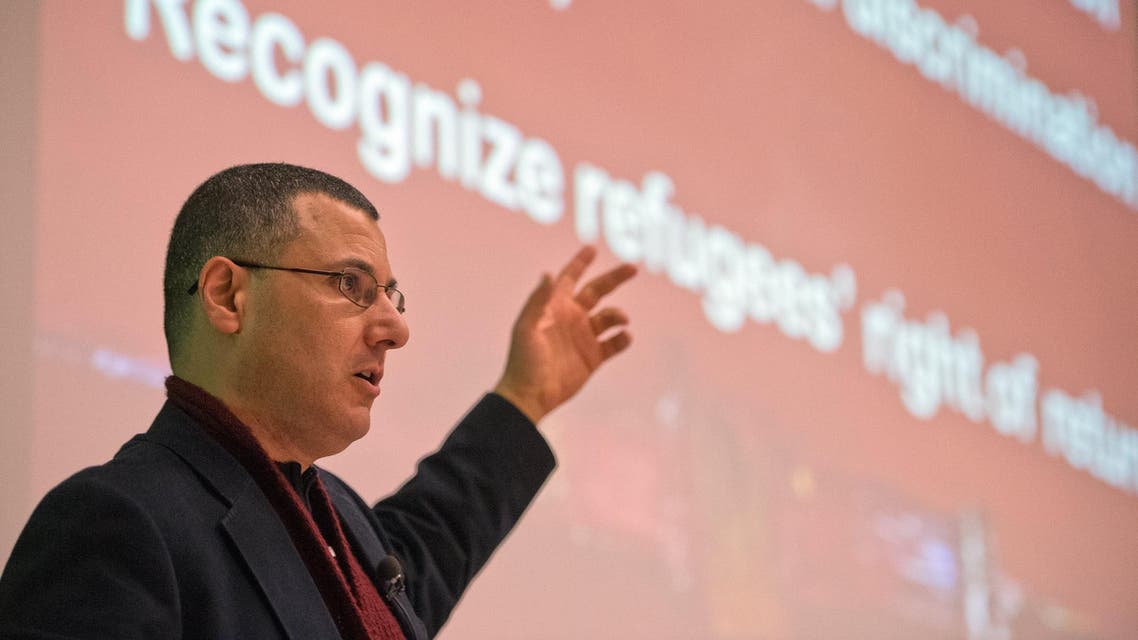 Omar Barghouti speaks during a conference at the ULB University in Brussels on April 30, 2013. (AFP)