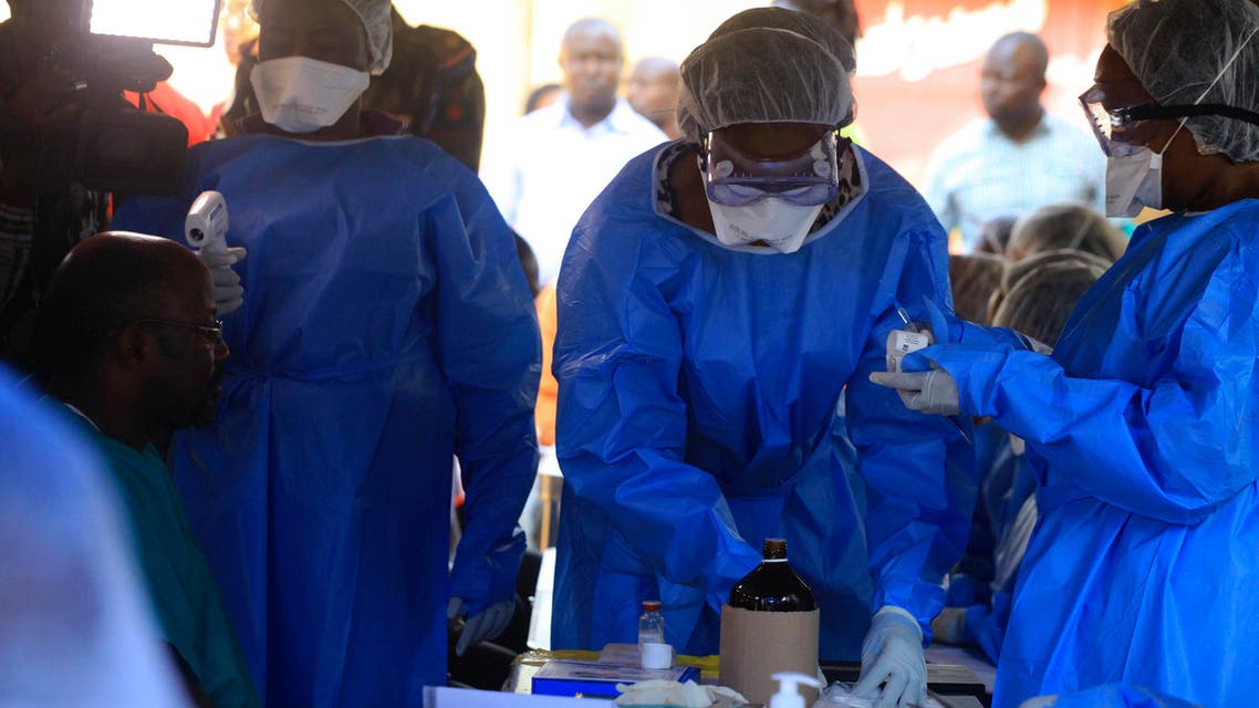 Healthcare workers from the World Health Organization prepare to give an Ebola vaccination to a front line aid worker in Beni Democratic Republic of Congo, Friday, Aug 10, 2018. (AP)