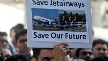 Jet Airways employees attend a protest demanding the release of their salaries outside company’s headquarters in Mumbai, India, on April 12, 2019. (Reuters)