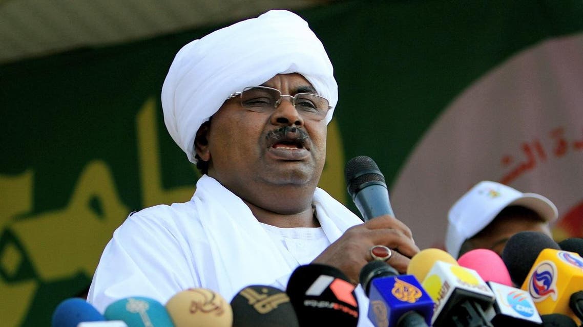 Salah Gosh, ex-chief of security now advisor to Sudanese President Omar al-Bashir, gives a speech during a mass wedding of some 1000 couples in what has been dubbed the "Marriage of Unity" on November 13, 2010. (AFP)