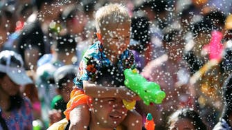 Thailand’s Buddhist New Year splashes in with water fights