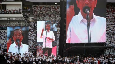 Indonesia's President Joko Widodo addresses supporters at a rally at Gelora Bung Karno Stadium in Jakarta. (Reuters)