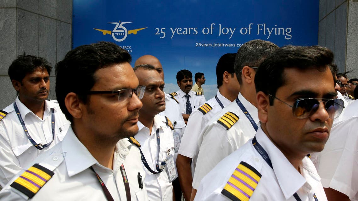 Employees of Jet Airways gather to demand clarification on unpaid salaries in Mumbai on April 15, 2019. (AP)