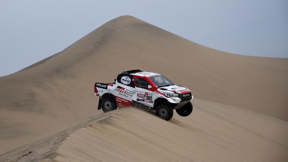 Toyota's driver Giniel De Villiers of South Africa and his co-driver Dirk Von Zitzewitz of Germany compete, during the Stage 9 of the Dakar 2019 in and around Pisco, Peru. (AFP)