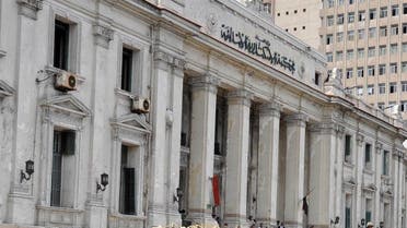 Egyptian soldiers stand guard outside Alexandria courtroom during the trial (AFP)