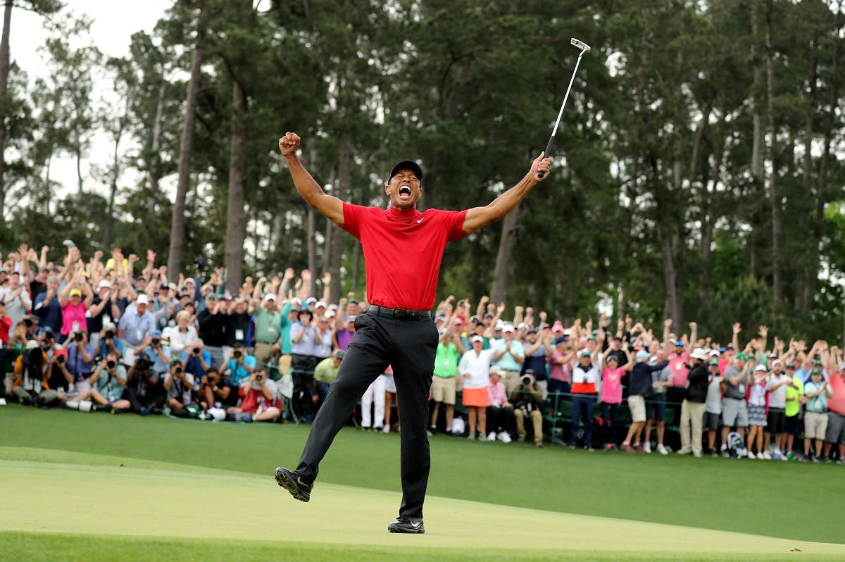 Tiger Woods celebrates on the 18th hole after winning the 2019 Masters. (Reuters)