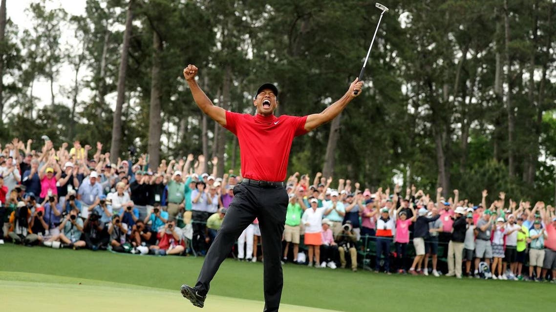 Tiger Woods celebrates on the 18th hole after winning the 2019 Masters. (Reuters)