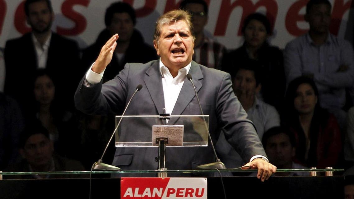 Peru's former president Alan Garcia talks to supporters during a meeting in Lima. (Reuters)