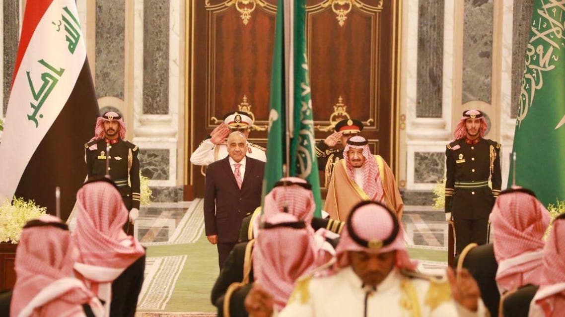 King Salman and Iraqi PM - Supplied