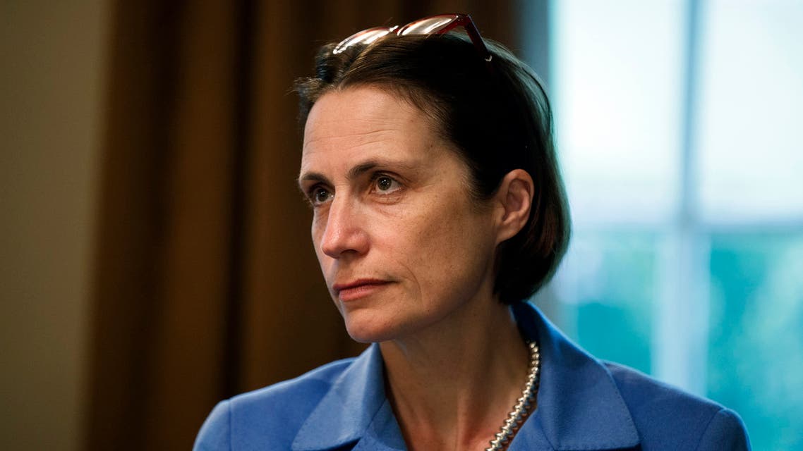 Fiona Hill, senior director for European and Russian Affairs on the National Security Council, listens as President Donald Trump speaks during a meeting NATO Secretary General Jens Stoltenberg in the Cabinet Room of the White House, Tuesday, April 2, 2019, in Washington. (AP Photo/Evan Vucci)
