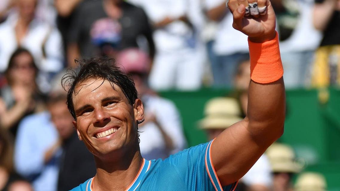 Rafael Nadal celebrates after winning against Spain’s Roberto Bautista Agut at then end of their tennis match on the day 5 of the Monte-Carlo ATP Masters Series tournament on April 17, 2019 in Monaco. (AFP)