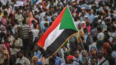 Sudanese protesters rally outside the army complex in Sudan’s capital Khartoum on April 18, 2019. (AFP)