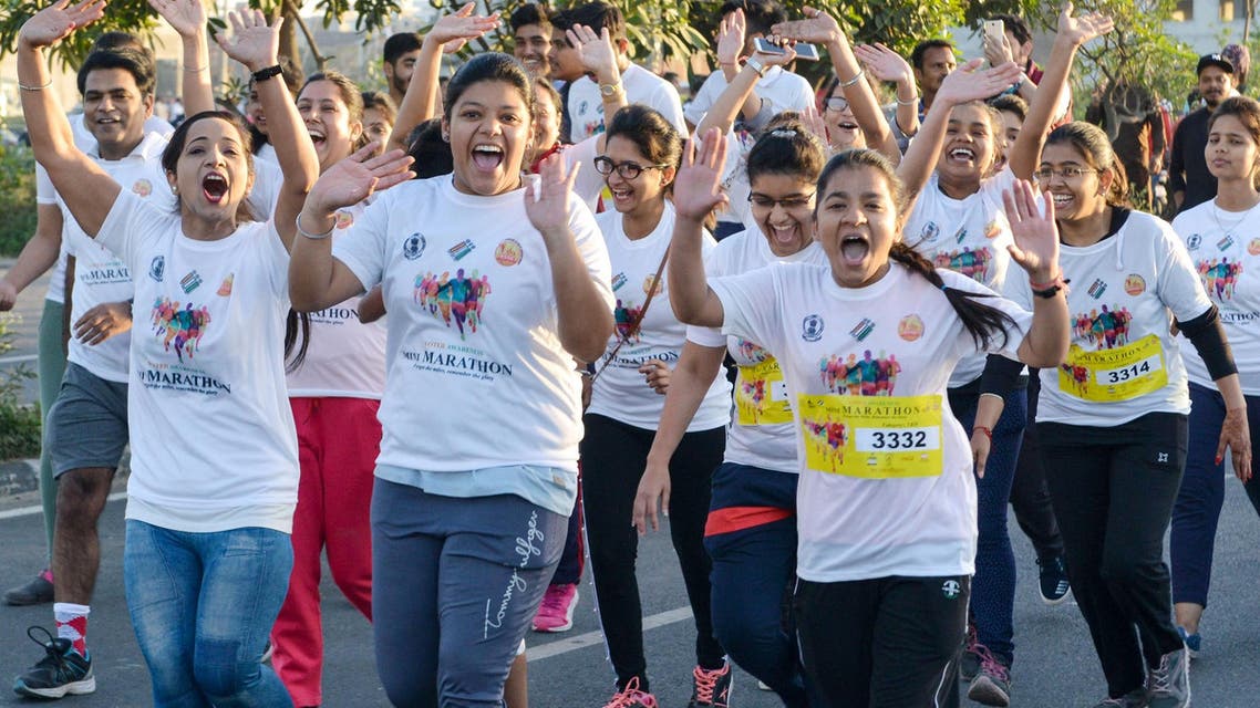 Indian runners take part in a “Voter Awareness Marathon” in Amritsar on March 31, 2019. (AFP)