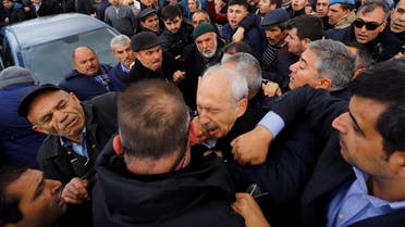 Kemal Kilicdaroglu, leader of the main opposition CHP, is attacked by a man during a funeral ceremony in Cubuk. (Reuters)