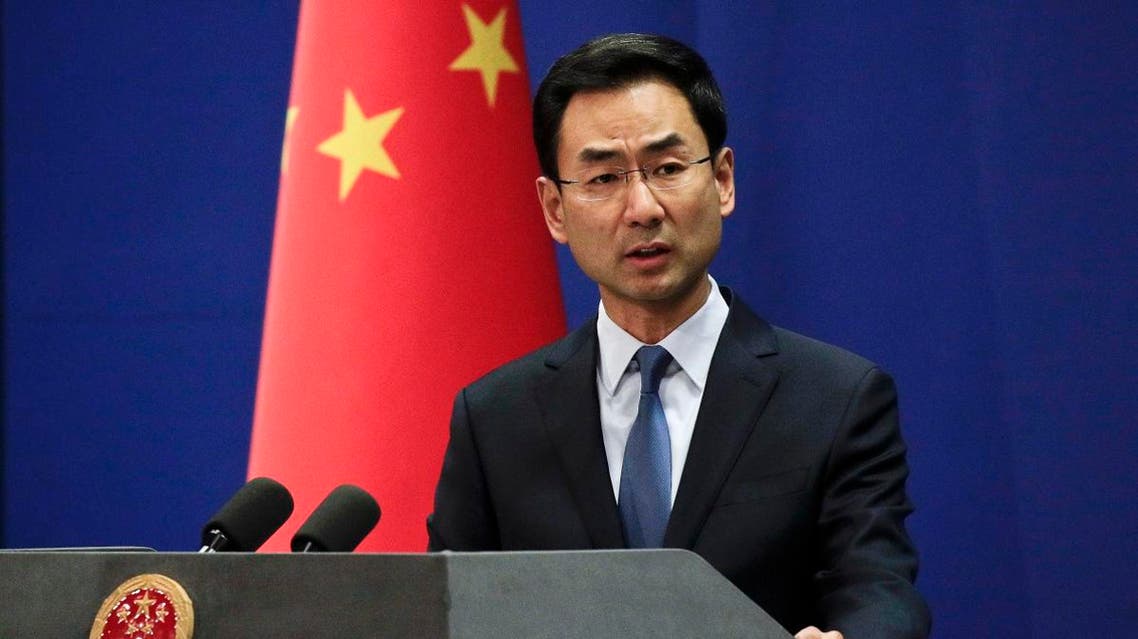 Chinese Foreign Ministry spokesman Geng Shuang speaks during a daily briefing at the Ministry of Foreign Affairs office in Beijing. (AP)