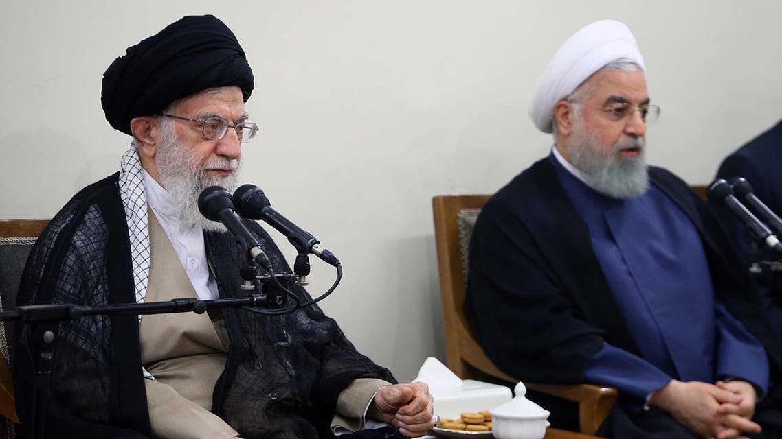 A handout picture provided by the office of Iran's supreme leader Ayatollah Ali Khamenei on August 29, 2018, shows Khamenei (L) speaking during a government meeting in the capital Tehran. To his right is Iran's president Hassan Rouhani. Iran's parliament declared its dissatisfaction with President Hassan Rouhani yesterday, voting to reject his answers after grilling him over the deteriorating economy.