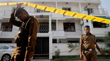 Police keep watch outside the family home of a bomber suspect where an explosion occurred during a Special Task Force raid, following a string of suicide attacks on churches and luxury hotels, in Colombo, Sri Lanka, on April 25, 2019. (Reuters)