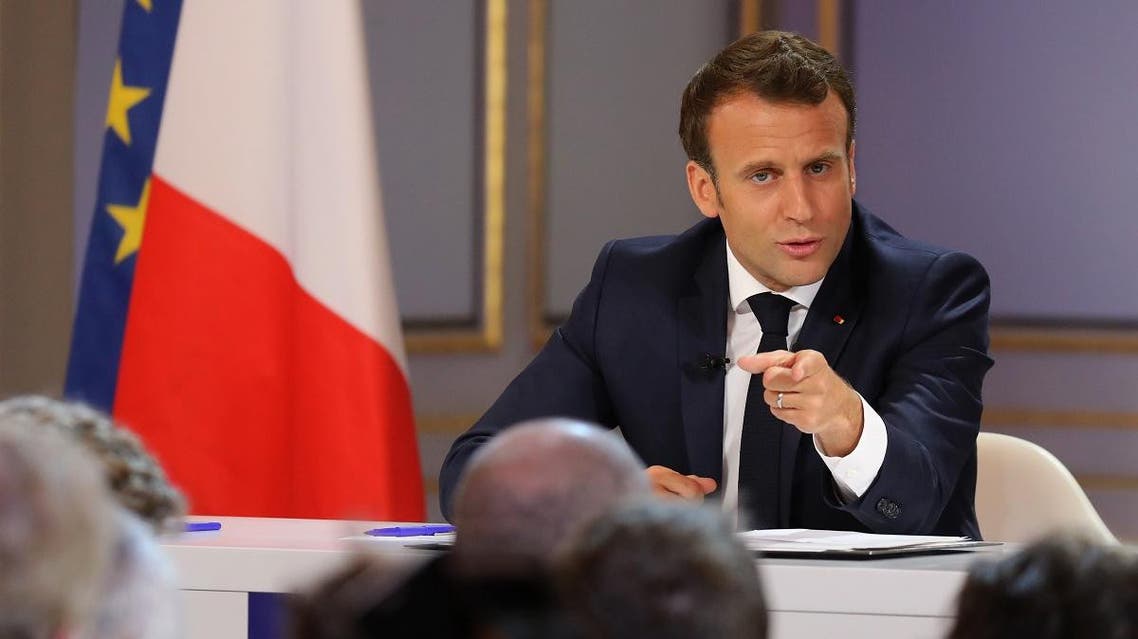 French President Emmanuel Macron gestures during his live address following the “Great National Debate”, at the Elysee Palace in Paris on April 25, 2019. (AFP)