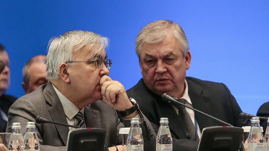 Aleksandr Lavrentyev (R), Russia's chief negotiator for Syria, attends the session of Syria peace talks in Astana on December 22, 2017. (AFP)