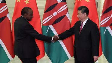 Kenyan President Uhuru Kenyatta shakes hands with Chinese President Xi Jinping before the meeting at the Great Hall of People in Beijing. (Reuters)
