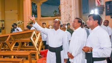 President Maithripala Sirisena (2nd R) visiting St. Sebastian’s church in Negombo on April 23, 2019, two days after a series of bomb attacks targeting churches and luxury hotels in Sri Lanka.(AFP)