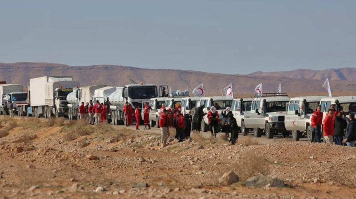This picture shows an aid convoy of the Red Crescent arriving at the Rukban desert camp for displaced Syrians along Syria’s border with Jordan on February 06, 2019. (AFP)