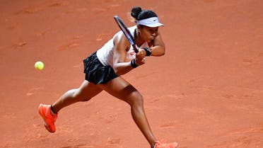 Japan's Naomi Osaka returns the ball to Taiwan's Su-Wei Hsieh during their round-of-16 match at the WTA Tennis Grand Prix in Stuttgart. (Reuters)