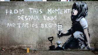 Suspected Banksy work tackles climate protests 