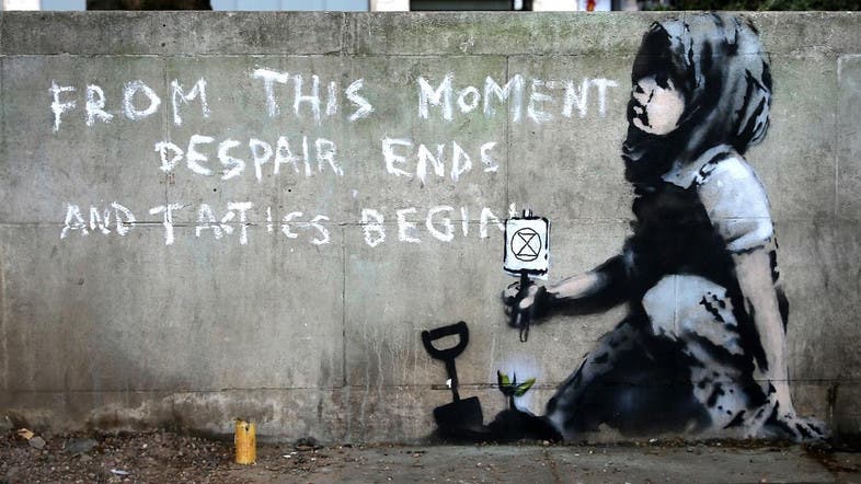 Suspected Banksy work tackles climate protests - Al Arabiya English