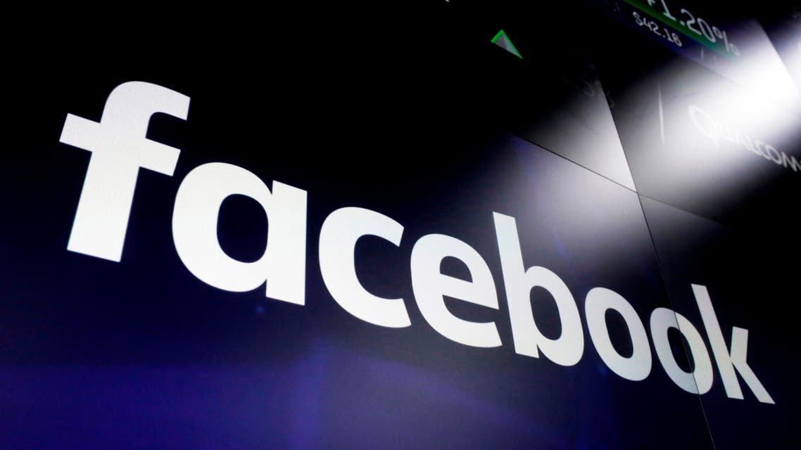 the logo for Facebook appears on screens in New York's Times Square. (AP)