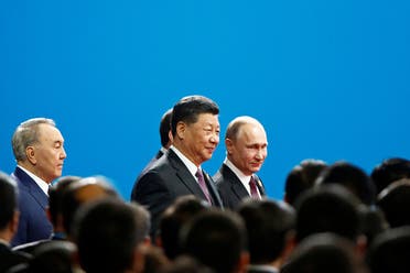 Chinese President Xi Jinping and Russian President Vladimir Putin arrive for the opening ceremony for the second Belt and Road Forum in Beijing, China, on April 26, 2019. (Reuters)