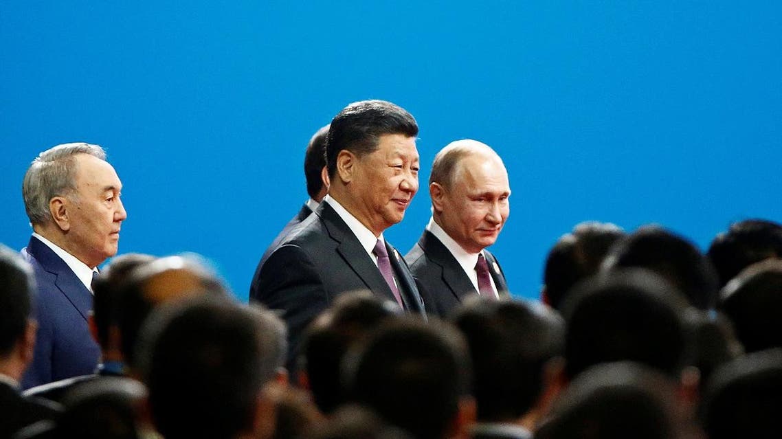 Chinese President Xi Jinping and Russian President Vladimir Putin arrive for the opening ceremony for the second Belt and Road Forum in Beijing, China, on April 26, 2019. (Reuters)