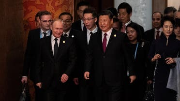 Russian President Vladimir Putin and Chinese President Xi Jinping arrive for a welcoming banquet at the Belt and Road Forum at the Great Hall of the People in Beijing, China, on April 26, 2019. (Reuters)