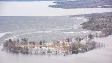 Flooded community is seen in this aerial photo taken from Canadian Armed Forces helicopters surveying the flood regions of the Saint John River Valley, near Fredericton, New Brunswick, Canada, April 24, 2019. Picture taken on April 24, 2019. Courtesy Lance Wade/Canadian Armed Forces/DND/Handout via REUTERS ATTENTION EDITORS - THIS IMAGE HAS BEEN SUPPLIED BY A THIRD PARTY. NO RESALES. NO ARCHIVES.