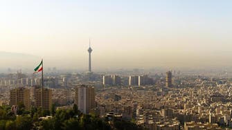 Iran halts some commitments under nuclear deal