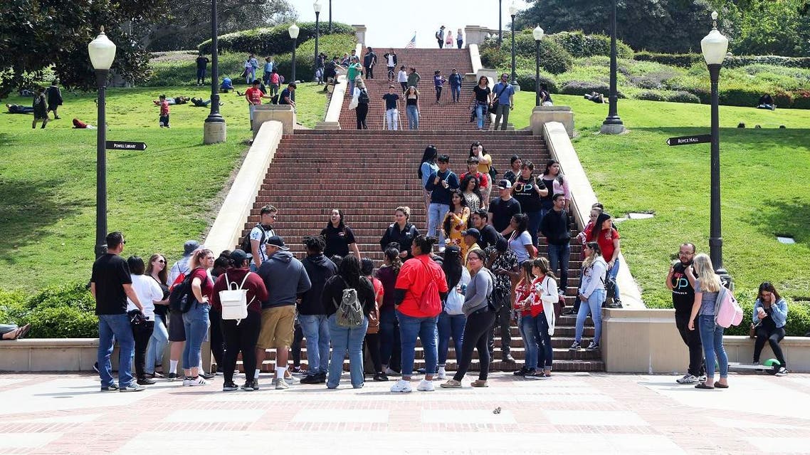 People move about the campus of the University of California, Los Angeles. (AP)