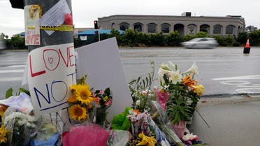 Signs of support and flowers adorn a post in front of the Chabad of Poway synagogue, Monday, April 29, 2019, in Poway, Calif. (AP)