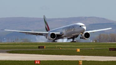 An Emirates Boeing 737-300 passenger jet lands at Manchester Airport in Manchester. (AFP)