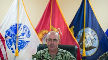 In this photo reviewed by U.S. military officials, U.S. Navy Rear Adm. John Ring, Joint Task Force Guantanamo Commander, speaks during a roundtable discussion with the media, Wednesday, June 17, 2019, in Guantanamo Bay Naval Base, Cuba. (AP Photo/Alex Brandon)