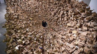 Intricate cardboard city rises in Manila art show