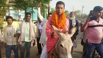 Indian politician charged after donkey ride to file papers
